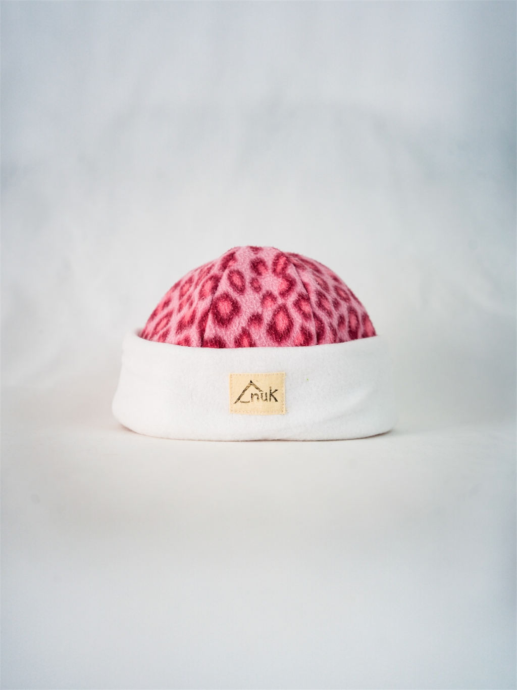 Bonnet blanc & léopard rose