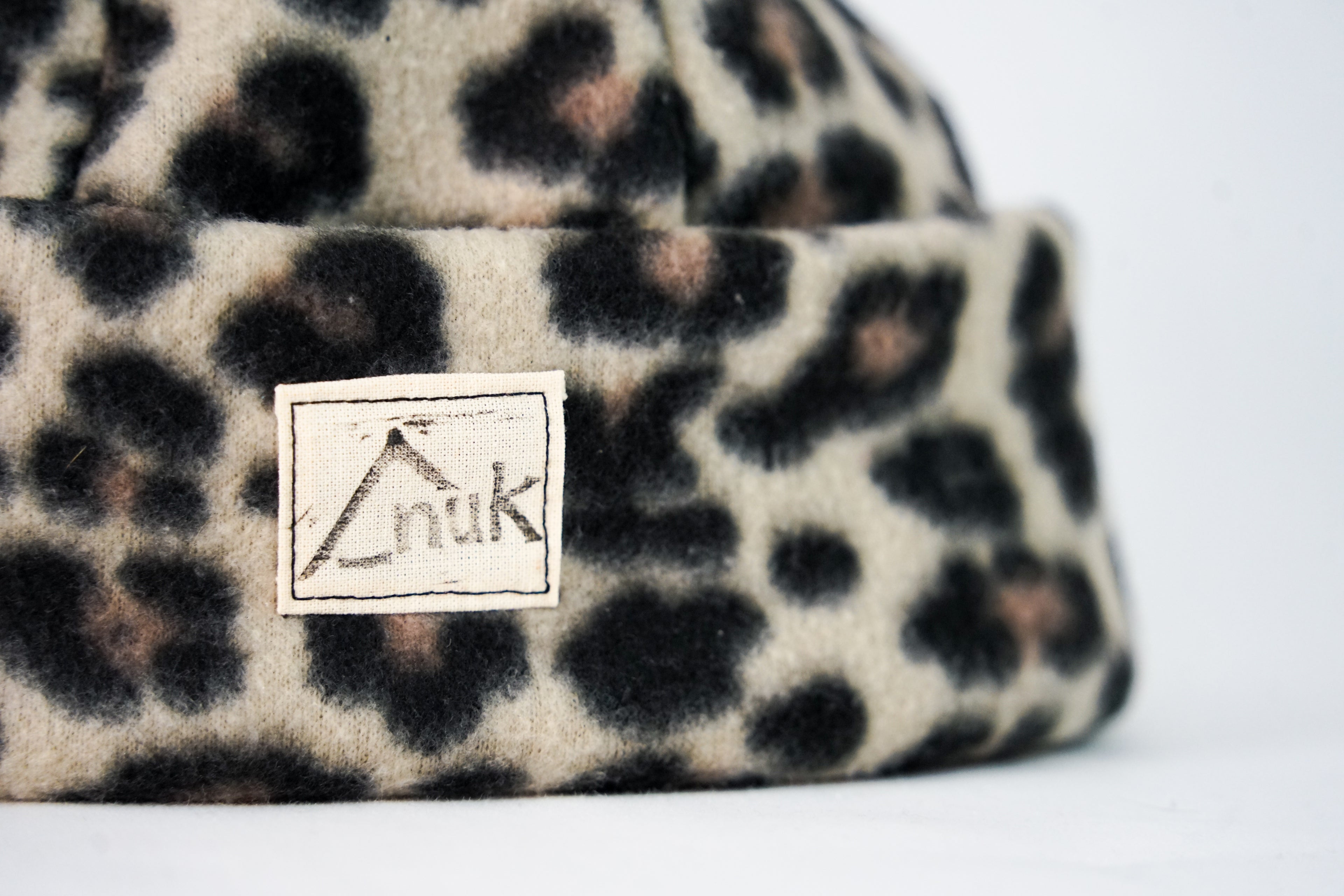 Bonnet léopard beige