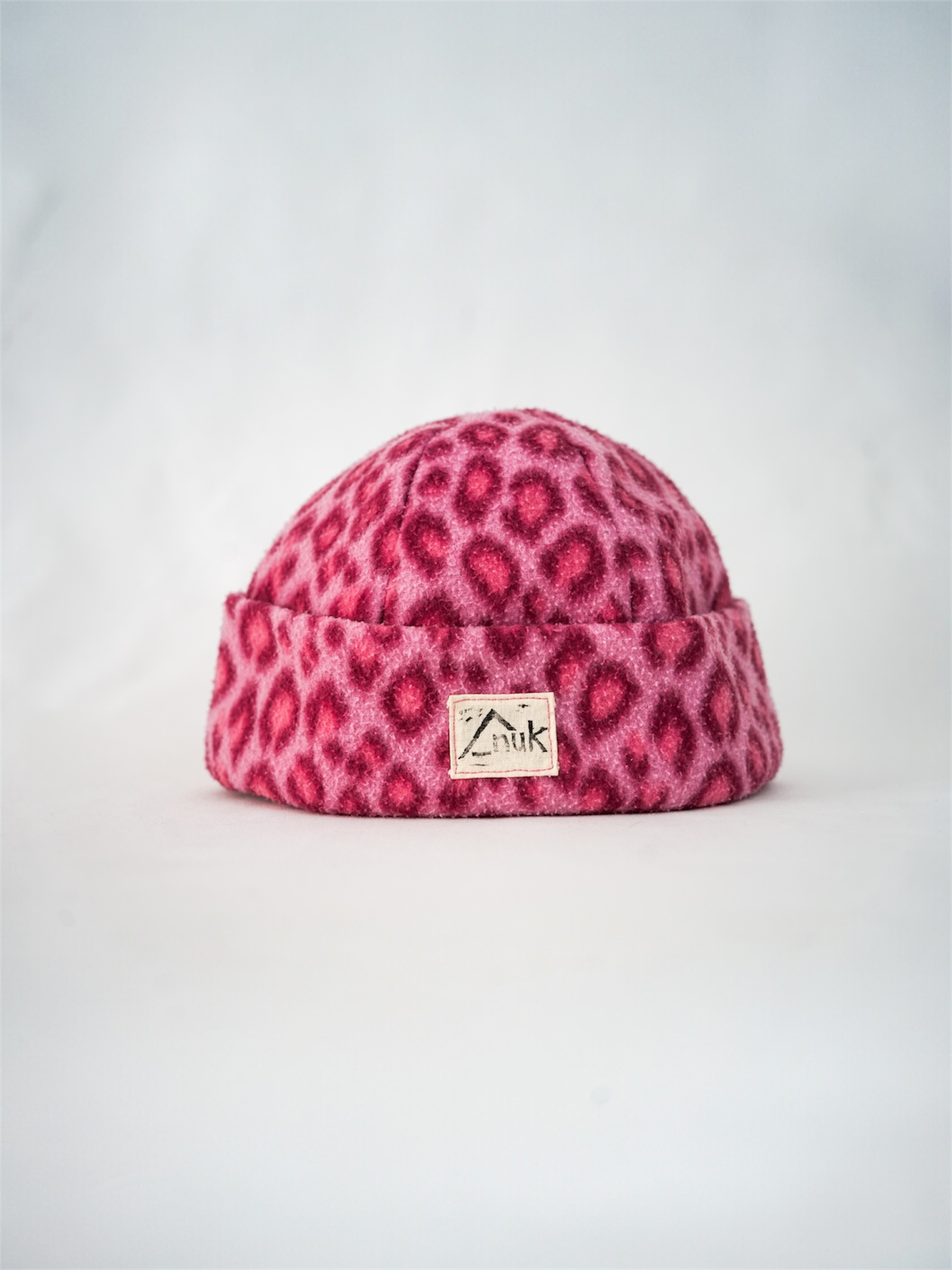 Bonnet léopard rose